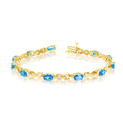 10K Yellow Gold Oval Blue Topaz Stones And Diamonds Tennis Bracelet, 7" fine designer jewelry for men and women
