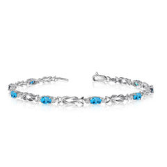 14K White Gold Oval Blue Topaz Stones And Diamonds Tennis Bracelet, 7" fine designer jewelry for men and women