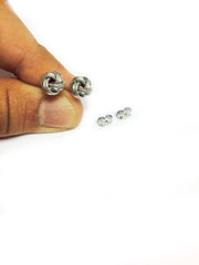 Sterling Silver Rhodium Finish 7mm Shiny And Textured Love Knot Stud Earrings - JewelryAffairs