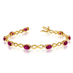 10K Yellow Gold Oval Ruby Stones And Diamonds Infinity Tennis Bracelet, 7" - JewelryAffairs
