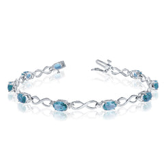14K White Gold Oval Blue Topaz Stones And Diamonds Infinity Tennis Bracelet, 7" - JewelryAffairs