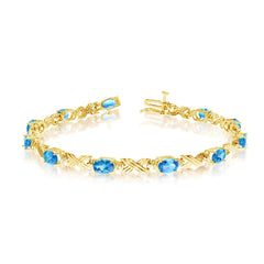 14K Yellow Gold Oval Blue Topaz Stones And Diamonds Tennis Bracelet, 7" - JewelryAffairs
