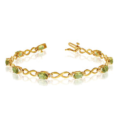 14K Yellow Gold Oval Peridot Stones And Diamonds Infinity Tennis Bracelet, 7" - JewelryAffairs