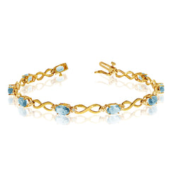 14K Yellow Gold Oval Aquamarine Stones And Diamonds Infinity Tennis Bracelet, 7"