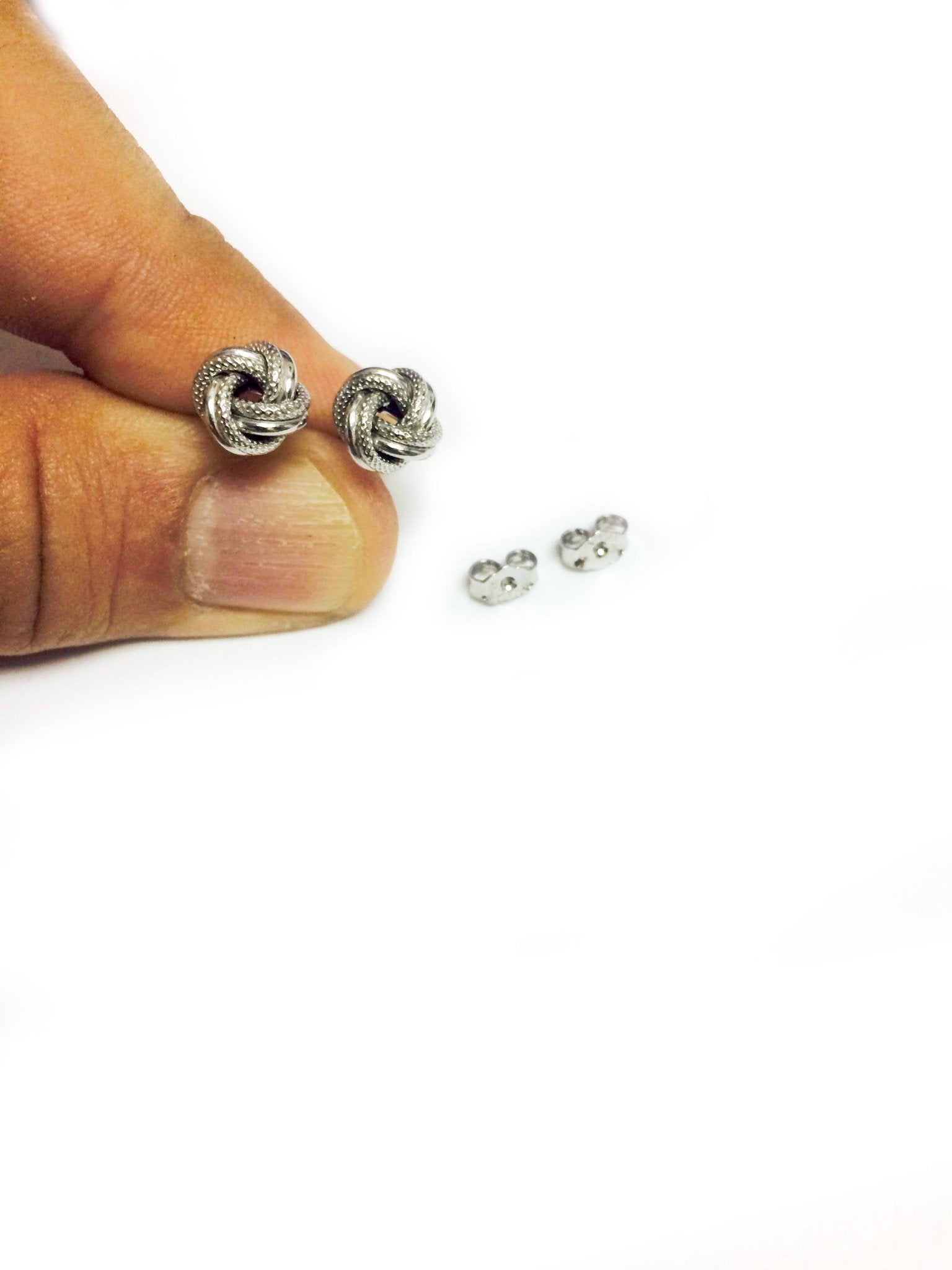 Sterling Silver Rhodium Finish 7mm Shiny And Textured Love Knot Stud Earrings - JewelryAffairs